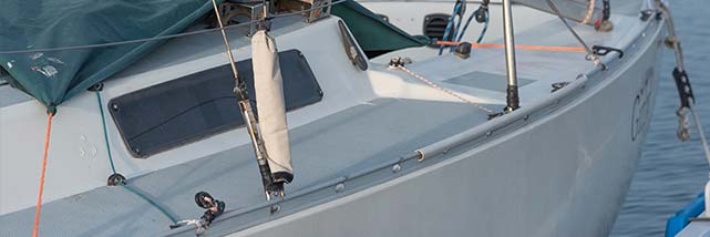 boat docked with weather protection covering overtop